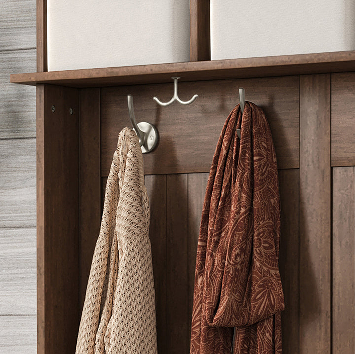 closeup of the hooks and cubes used on a John Louis Home hall tree